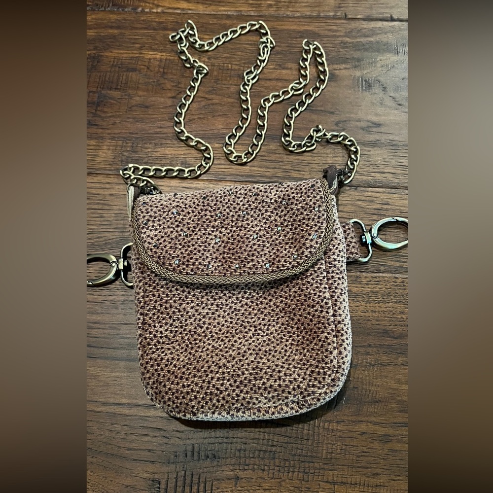 Anjelica jewel bag. Crossbody or can hooked to your belt loops.  Leopard print